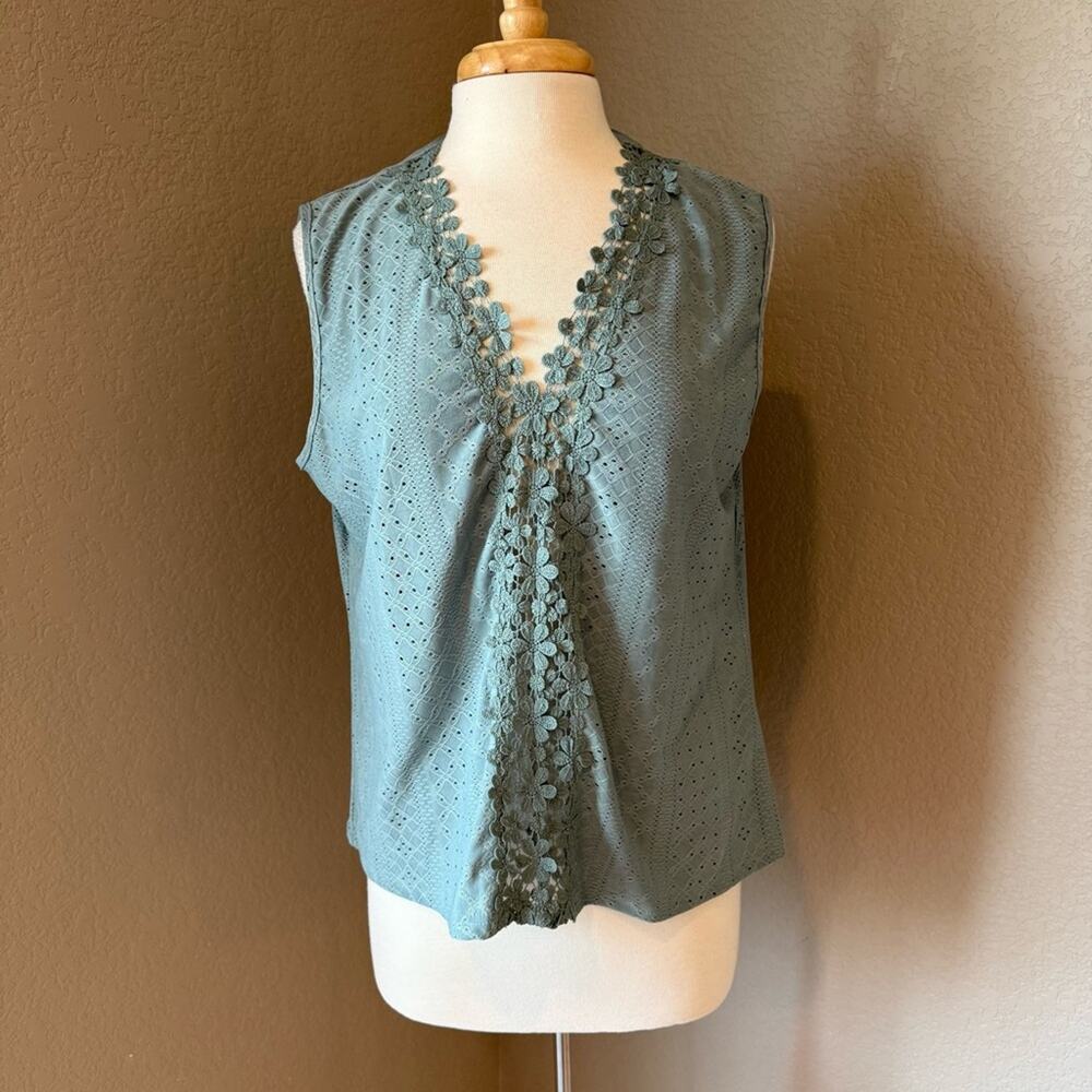 Chic Sleeveless Top with Floral Embroidered Accents